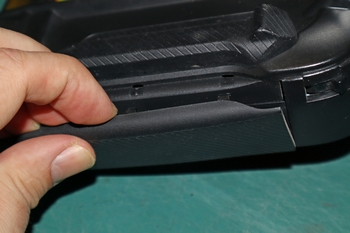 Décrochage des grips latéraux