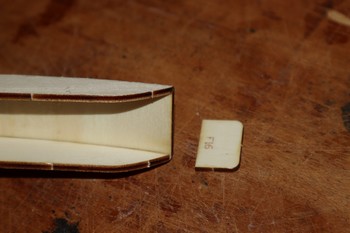 Languette sous la trappe